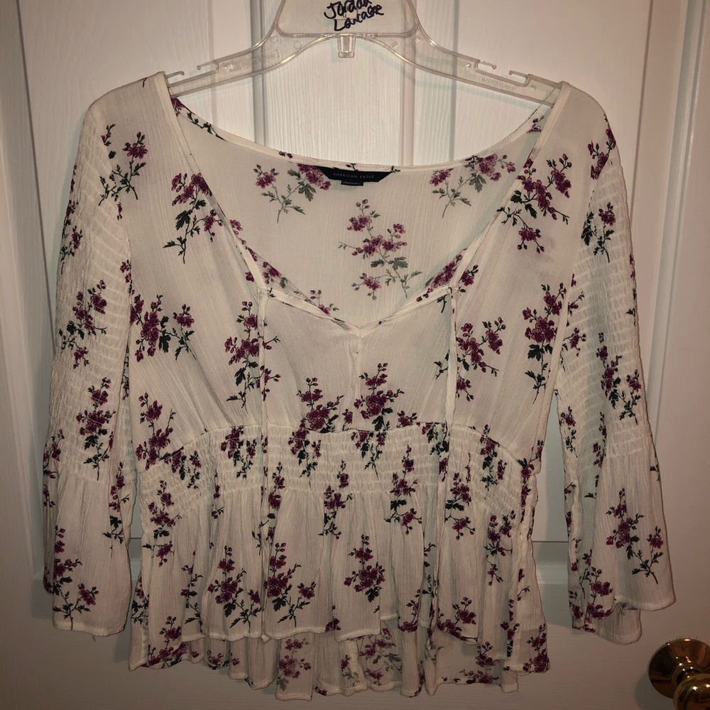 White floral smocked top.